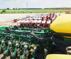 14-close-up-of-seeder-attached-to-tractor-in-field.jpg